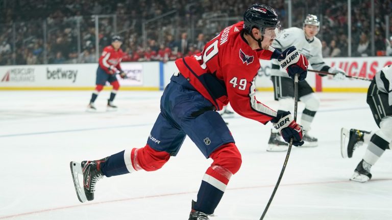 Washington Capitals center Brett Leason (49) shoots during the first period of an NHL hockey game against the Los Angeles Kings Wednesday, Nov. 17, 2021, in Los Angeles. (Ashley Landis/AP Photo)