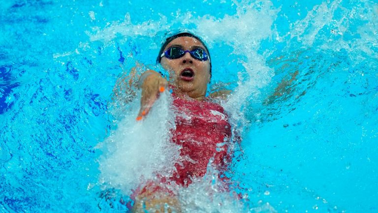 Kylie Masse of Canada competes during her women's 100m backstroke heat. (Petr David Josek/AP Photo)