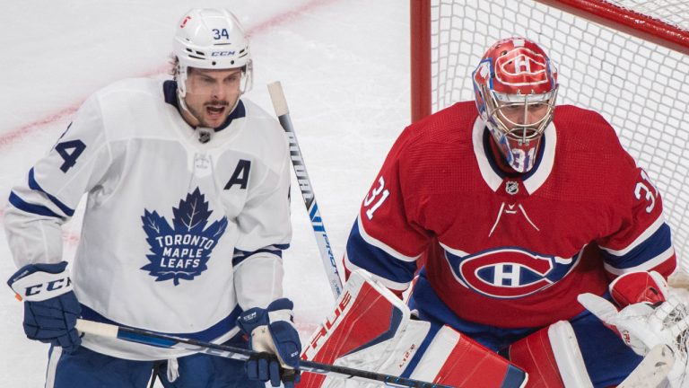 Toronto Maple Leafs' Auston Matthews moves in on Montreal Canadiens goaltender Carey Price during overtime period of game six NHL Stanley Cup playoff hockey action in Montreal, Saturday, May 29, 2021. (Graham Hughes/CP)