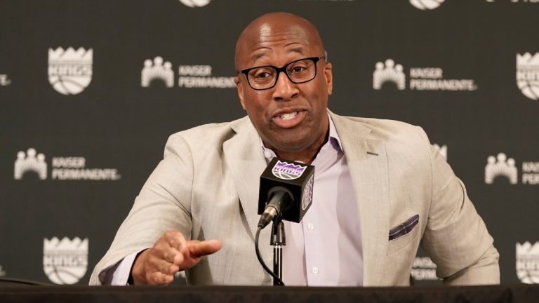 Mike Brown, right, the new head coach of the NBA Sacramento Kings basketball team answers a question during a news conference with Kings general manager Monte McNair, left, in Sacramento, Calif., Tuesday, June 21, 2022. Brown, who this season was an assistant coach with the NBA Champion Golden State Warriors, is taking over the franchise with the longest playoff drought in NBA history. (Rich Pedroncelli/AP)