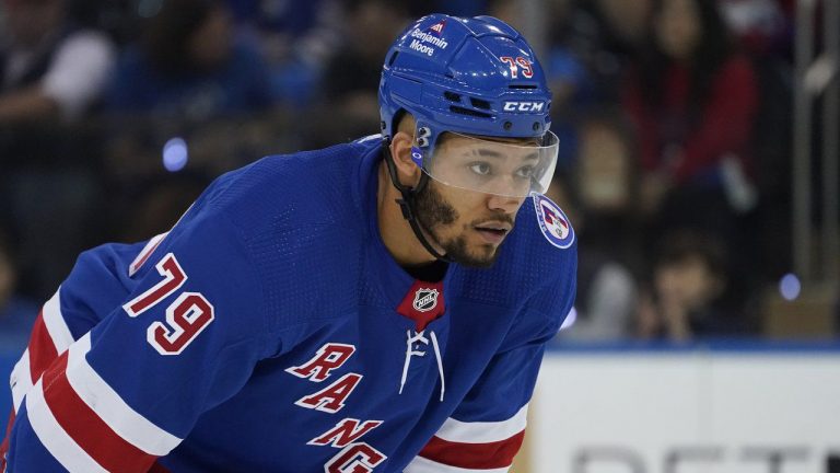 New York Rangers defenceman K'Andre Miller (79) sets up for a face-off during the first period of Game 6 of an NHL hockey Stanley Cup second-round playoff series against the Carolina Hurricanes, Saturday, May 28, 2022, in New York. (John Minchillo, File/AP)