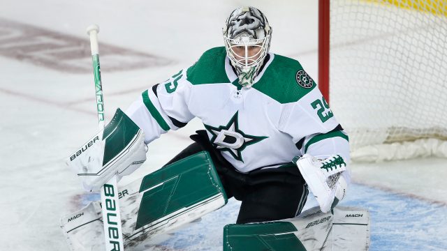 April 21, 2022, Calgary, AB, Canada: Dallas Stars goalie Jake Oettinger  makes a save during first period NHL hockey action against the Calgary  Flames in Calgary on Thursday April 21, 2022. (Credit
