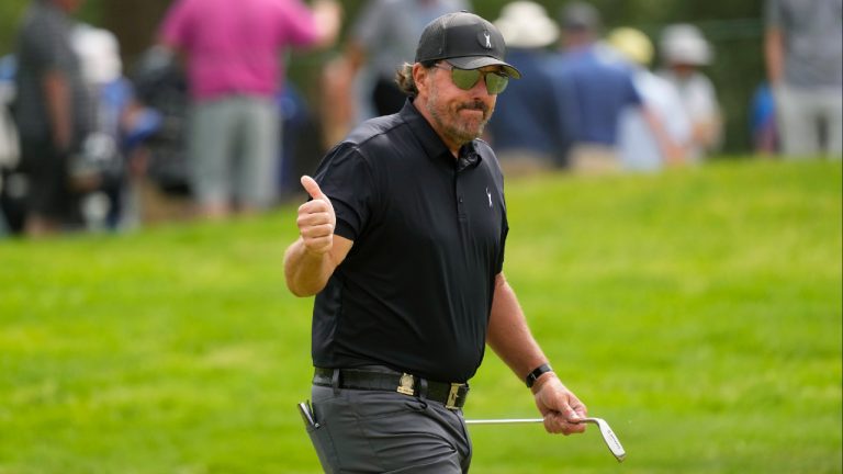 Phil Mickelson reacts to the crowd on the eighth hole during the first round of the U.S. Open golf tournament at The Country Club, Thursday, June 16, 2022, in Brookline, Mass. (Charlie Riedel/AP)