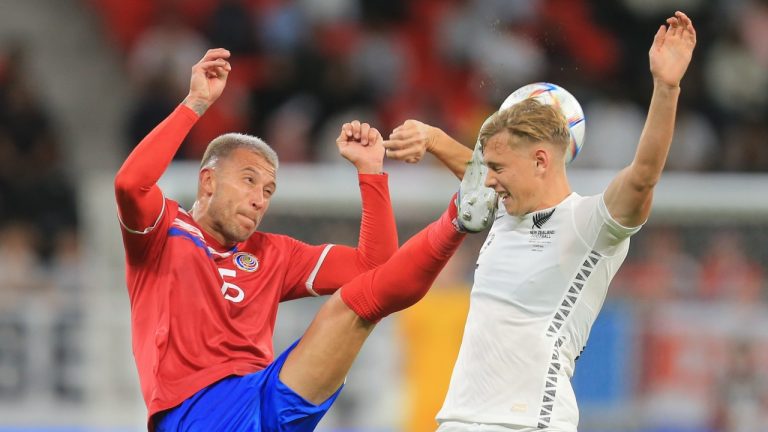 Costa Rica's Francisco Calva, left, and New Zealand's Ben Weine fight for the ball during the World Cup 2022 qualifying play-off soccer match between New Zealand and Costa Rica in Al Rayyan, Qatar, Tuesday, June 14, 2022. (Hussein Sayed/AP Photo)