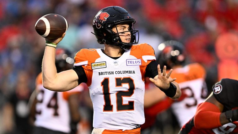 BC Lions quarterback Nathan Rourke (12) throws the ball during first half CFL football action against the Ottawa Redblacks in Ottawa on Thursday, June 30, 2022. (Justin Tang/The Canadian Press)