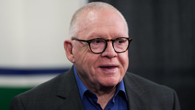 Vancouver Canucks president of hockey operations Jim Rutherford arrives for an end of NHL hockey season news conference, in Vancouver, on Tuesday, May 3, 2022. (Darryl Dyck/CP)