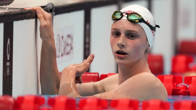 Summer McIntosh of Canada rests after her heat of the women's 800-meter freestyle at the 2020 Summer Olympics, Thursday, July 29, 2021, in Tokyo, Japan. (Matthias Schrader/AP)