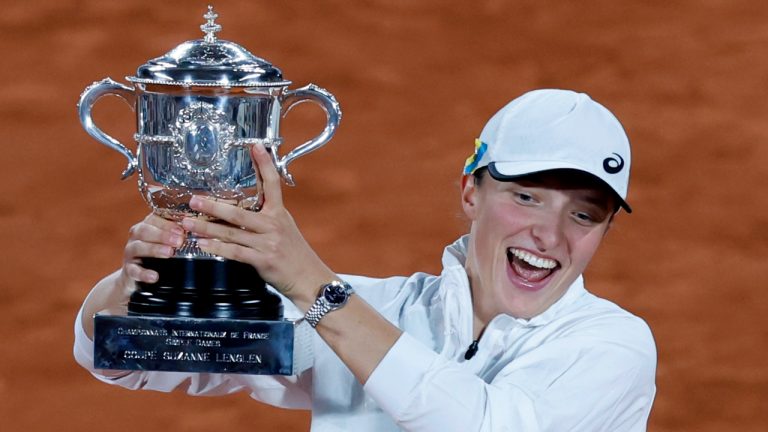 Poland's Iga Swiatek celebrates with the cup after defeating Coco Gauff of the U.S.in their final of the French Open tennis tournament at the Roland Garros stadium Saturday, June 4, 2022 in Paris. Swiatek won 6-1, 6-3. (Jean-Francois Badias/AP)