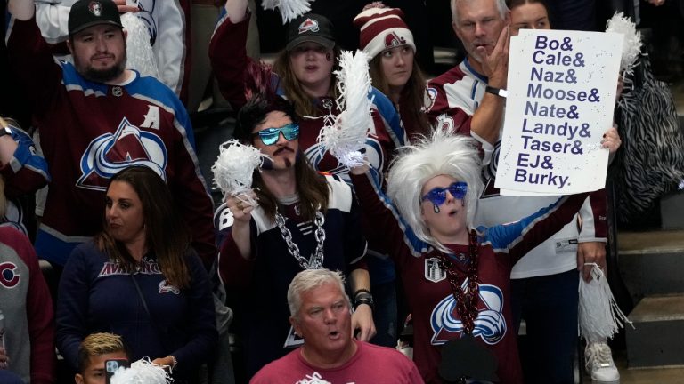 Colorado Avalanche fans watch during the second period in Game 2 of the team's NHL hockey Stanley Cup Final against the Tampa Bay Lightning, Saturday, June 18, 2022, in Denver. (David Zalubowski/AP)