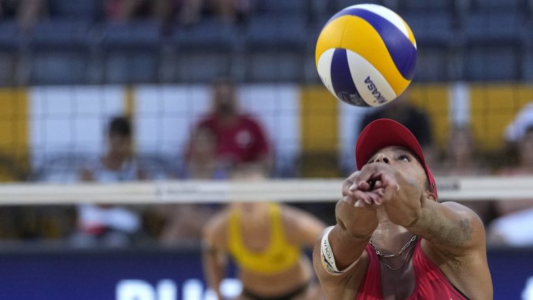 Canada's Brandie Wilkerson goes for the ball during the beach volley semifinal match between Germany's Mueller-Tillmann and Canada's Bukovec-Brandie at the beach volley World Championships in Rome, Saturday, June 18, 2022. (Andrew Medichini/CP, AP)