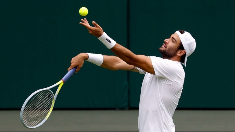 Italy's Matteo Berrettini serves the ball to Spain's Rafael Nadal during their practice on Center Court ahead of the 2022 Wimbledon Championship at the All England Lawn Tennis and Croquet Club, in London, Thursday, June 23, 2022. (Steven Paston/PA via AP)