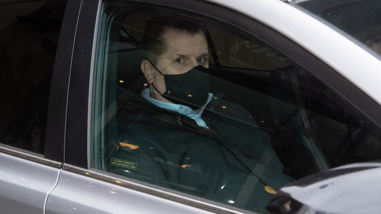 Former Vancouver Whitecaps and Canada U-20 women's soccer coach Bob Birarda leaves his lawyer's office in a vehicle after appearing in provincial court via a video link, in Vancouver, on Tuesday, February 8, 2022. Birarda has pleaded guilty to three counts of sexual assault and one count of touching a young person for a sexual purpose. (Darryl Dyck/CP) 