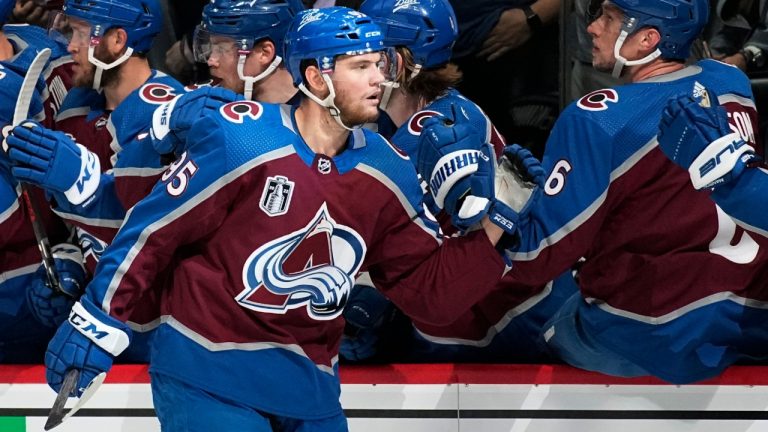 Colorado Avalanche left wing Andre Burakovsky is congratulated for his goal against the Tampa Bay Lightning during the first period in Game 2 of the NHL hockey Stanley Cup Final, Saturday, June 18, 2022, in Denver. (John Locher/AP)