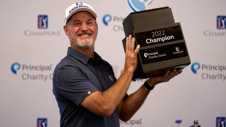 Jerry Kelly holds the trophy after winning the PGA Tour Champions Principal Charity Classic golf tournament, Sunday, June 5, 2022, in Des Moines, Iowa. (Charlie Neibergall/AP)