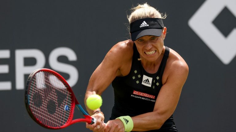 Germany's Angelique Kerber returns the ball to Russia's Anastasia Gasanova during their WTA Bad Homburg tournament tennis match, in Bad Homburg, Germany, Tuesday, June 21, 2022. (Joaquim Ferreira/dpa via AP)