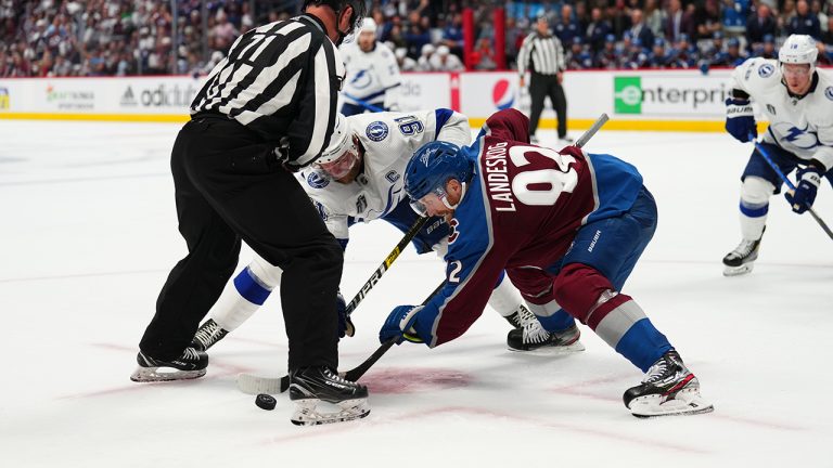 Colorado Avalanche left wing Gabriel Landeskog (92) and Tampa Bay Lightning center Steven Stamkos (91) face off during the third period in Game 5 of the NHL hockey Stanley Cup Final. (Jack Dempsey/AP)