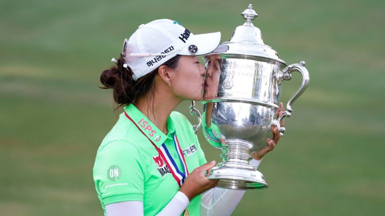 Minjee Lee, of Australia, kisses the Harton S. Semple Trophy after Lee won the final round of the U.S. Women's Open golf tournament at the Pine Needles Lodge & Golf Club in Southern Pines, N.C., on Sunday, June 5, 2022. Minjee Lee, of Australia, won the match. (Steve Helber/AP)