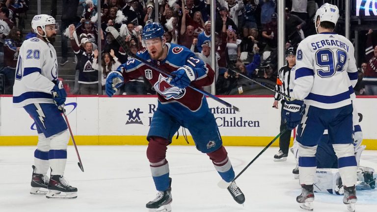 Colorado Avalanche right wing Valeri Nichushkin (13) celebrates after scoring against the Tampa Bay Lightning during the first period in Game 2 of the NHL hockey Stanley Cup Final. ,(John Locher/AP)       