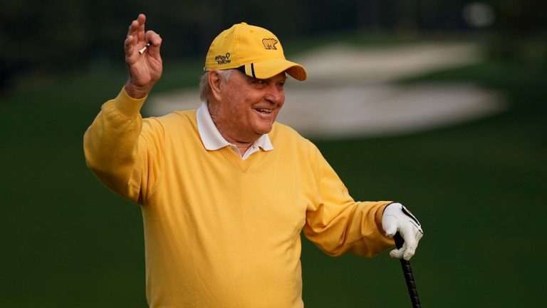 Jack Nicklaus waves after hitting a ceremonial first tee shot during the first round of the Masters golf tournament on Thursday, April 8, 2021, in Augusta, Ga. (David J. Phillip/AP)