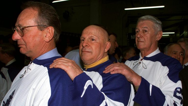 TORONTO, Feb. 13--GARDEN FAREWELL--Former Toronto Maple Leafs Jim Pappin (Left), Carl Brewer and Eddie Litzenberger (Right) line up in the depths of Maple Leaf Gardens as they prepare to head on to the ice for the closing ceremonies following the Leafs final game in the Gardens in Toronto, Saturday.(CP PHOTO) 1999 (stf-Frank Gunn)