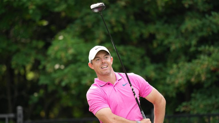 Rory McIlroy watches his tee shot on the 17th hole on his way to winning the Canadian Open. (Nathan Denette/CP)