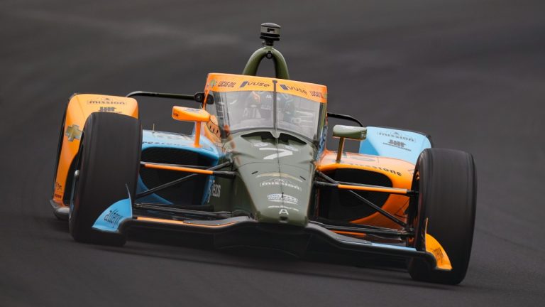 Felix Rosenqvist, of Sweden, drives through the first turn during qualifications for the Indianapolis 500 auto race at Indianapolis Motor Speedway in Indianapolis, Saturday, May 21, 2022. (Michael Conroy/AP)