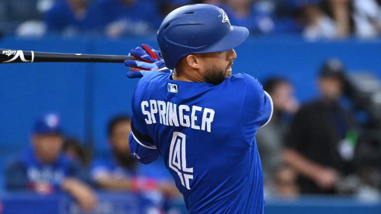 Toronto Blue Jays' centre fielder George Springer (4) hits a single in the first inning of American League baseball action against the Baltimore Orioles in Toronto on Monday, June 13, 2022. (Jon Blacker/CP)