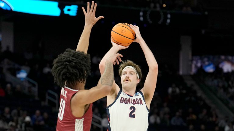 Gonzaga forward Drew Timme (2) shoots against Arkansas forward Jaylin Williams during the first half of a college basketball game in the Sweet 16 round of the NCAA tournament in San Francisco, Thursday, March 24, 2022. (Tony Avelar/AP)