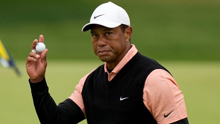 Tiger Woods waves after his third round on the 18th hole at the PGA Championship golf tournament at Southern Hills Country Club, Saturday, May 21, 2022, in Tulsa, Okla. (Eric Gay/AP)