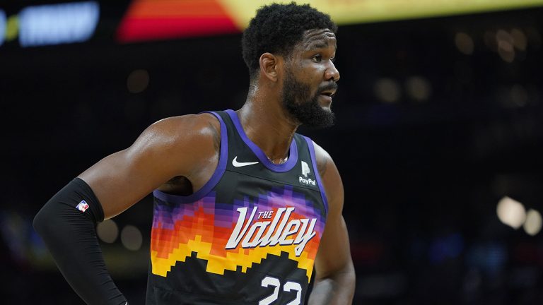 Phoenix Suns center Deandre Ayton (22) looks away after being fouled during the first half of Game 7 of an NBA basketball Western Conference playoff semifinal against the Dallas Mavericks in Phoenix, Ariz. (Matt York, File/AP)