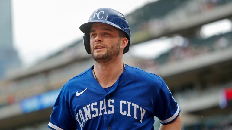 Kansas City Royals' Andrew Benintendi returns to the dugout after scoring against the Minnesota Twins in the first inning of a baseball game Saturday, May 28, 2022, in Minneapolis. (Bruce Kluckhohn/AP Photo)