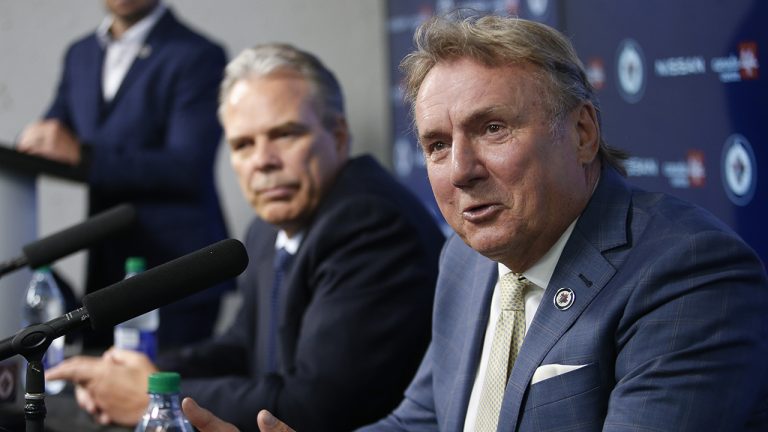 Winnipeg Jets new head coach Rick Bowness speaks at a press conference with General Manager Kevin Cheveldayoff in Winnipeg, Monday, July 4, 2022. (John Woods/CP)