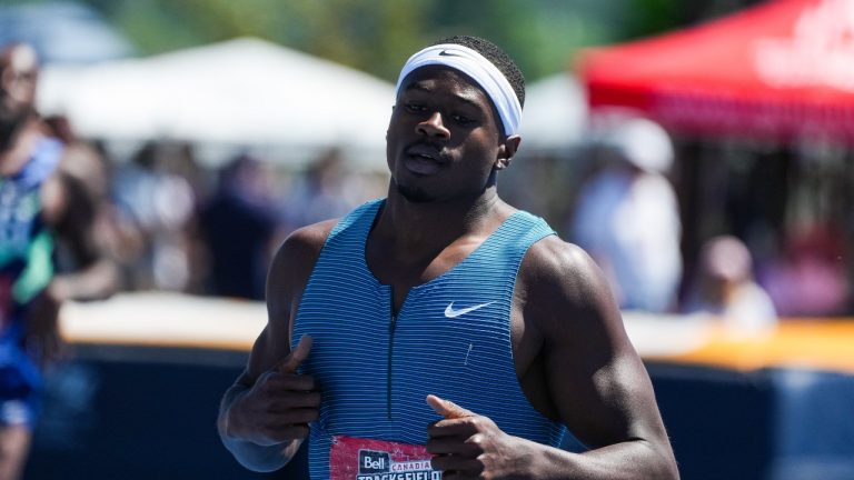 Aaron Brown, of Toronto, races to a first place finish in the men's 200 metre final at the Canadian Track and Field Championships in Langley, B.C., on Sunday, June 26, 2022. (Darryl Dyck/THE CANADIAN PRESS)