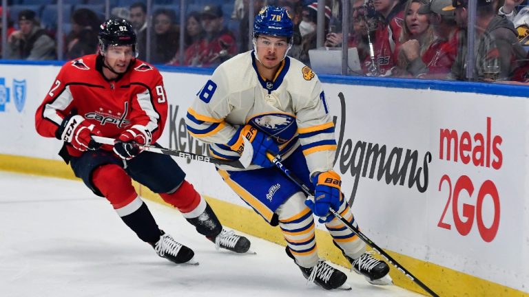 Buffalo Sabres defenceman Jacob Bryson, right, has signed a new two-year contract. (Adrian Kraus/AP)