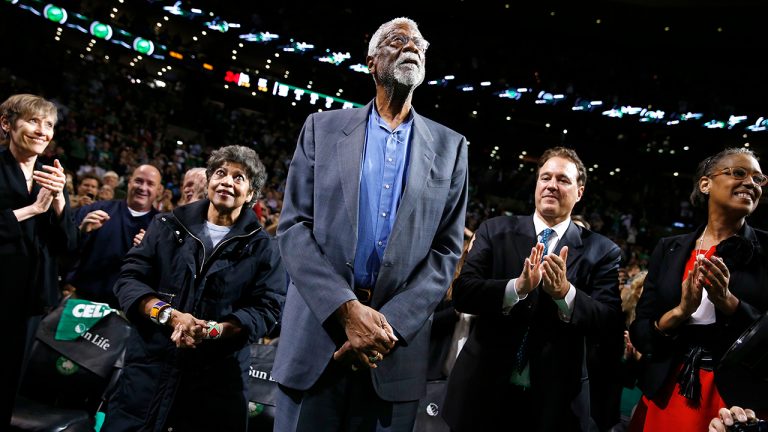 FILE - Boston Celtics legend Bill Russell looks up at the crowd during a tribute in his honor in the second quarter of an NBA basketball game against the Milwaukee Bucks in Boston, Nov. 1, 2013. (Michael Dwyer/AP)