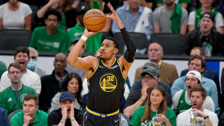 Golden State Warriors forward Otto Porter Jr. (32) puts up a shot against the Boston Celtics during the second quarter of Game 3 of basketball's NBA Finals, Wednesday, June 8, 2022, in Boston. (AP Photo/Steven Senne)