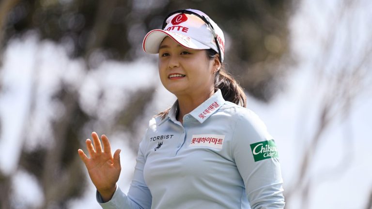 Choi Hye-jin, of South Korea, waves before hitting her tee shot on the first hole during the third round of the JTBC LPGA golf tournament, Saturday, March 26, 2022, in Carlsbad, Calif. (Denis Poroy/AP Photo)