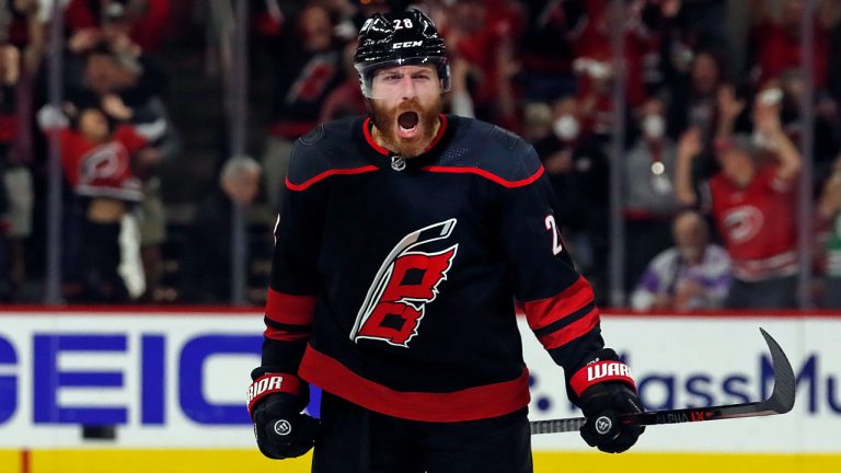 Carolina Hurricanes' Ian Cole (28) celebrates his overtime goal against the New York Rangers in Game 1 of an NHL hockey Stanley Cup second-round playoff series in Raleigh, N.C., Wednesday, May 18, 2022. (Karl B DeBlaker/AP)