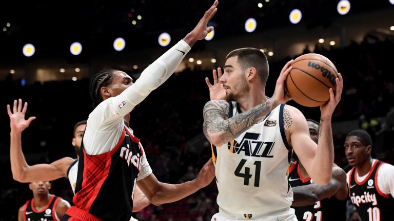 Forward Juancho Hernangomez, right, during a recent season with the Utah Jazz. (Steve Dykes/aP)