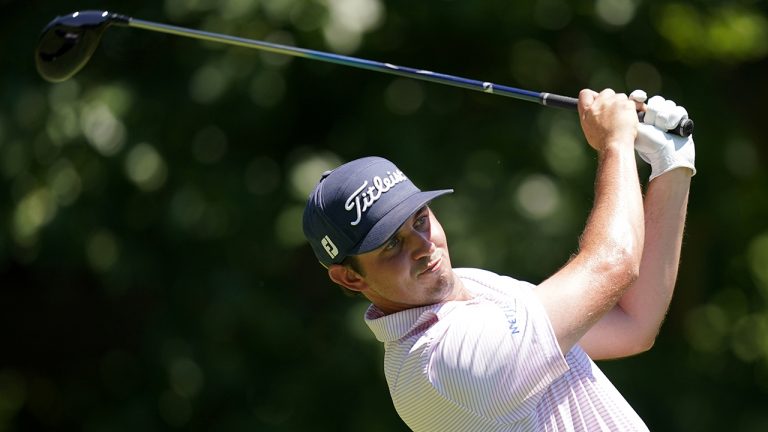 J.T. Poston hits off the second tee during the final round of the John Deere Classic golf tournament, Sunday, July 3, 2022, at TPC Deere Run in Silvis, Ill. (Charlie Neibergall/AP)