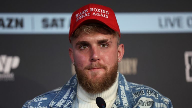 Boxing co-promoter Jake Paul wears a "Make Boxing Great Again" cap during a press conference at the Leadenhall Building in London, on the second leg of the press tour to promote the upcoming fight between Ireland's Katie Taylor and Puerto Rico's Amanda Serrano, Monday, Feb. 7, 2022. (AIan Walton/AP)