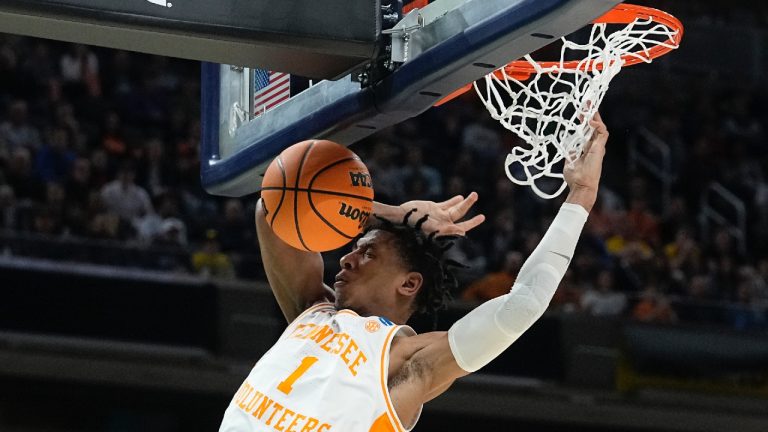 Tennessee's Kennedy Chandler dunks during the first half of a college basketball game against Michigan in the second round of the NCAA tournament, Saturday, March 19, 2022, in Indianapolis. (Darron Cummings/AP)