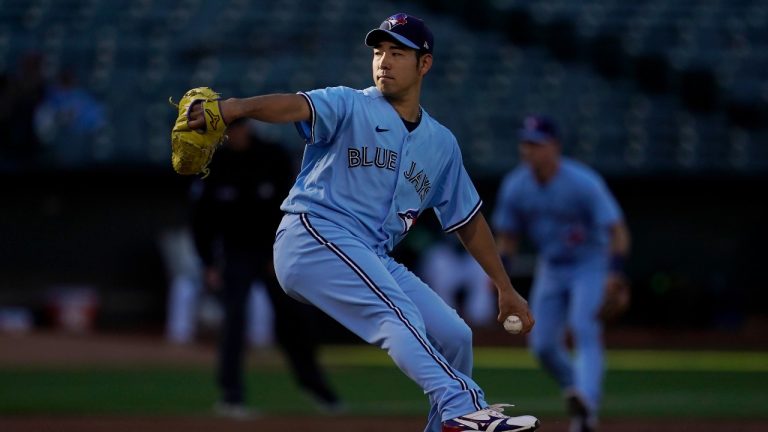 Toronto Blue Jays' Yusei Kikuchi pitches against the Oakland Athletics during the first inning of a baseball game in Oakland, Calif., Tuesday, July 5, 2022. (Jeff Chiu/AP Photo)