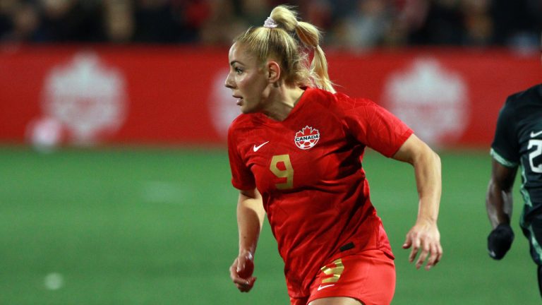 Canada's Adriana Leon (9) looks for an opening as Nigeria's Chinwen Alozie (2) tries to catch up during second half soccer action during the national team celebration tour at Starlight Stadium in Langford, B.C., Monday, April 11, 2022. Canada tied Nigeria 2-2. (Chad Hipolito/CP)