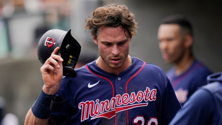 Minnesota Twins' Max Kepler walks in the dugout after being replaced with a pinch runner during the third inning of a baseball game against the Detroit Tigers, Sunday, July 24, 2022, in Detroit. (Carlos Osorio/AP)