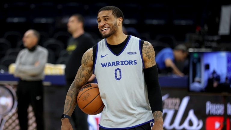 Golden State Warriors guard Gary Payton II (0) smiles during NBA basketball practice in San Francisco, Wednesday, June 1, 2022. The Warriors are scheduled to host the Boston Celtics in Game 1 of the NBA Finals on Thursday. (Jed Jacobsohn/AP Photo)