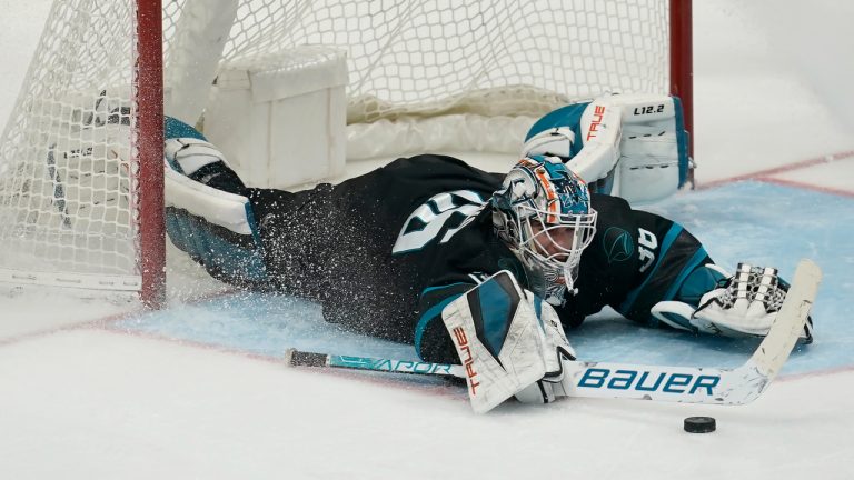 San Jose Sharks goaltender Zach Sawchenko defends against a shot by the Colorado Avalanche during the third period of an NHL hockey game in San Jose, Calif., Friday, March 18, 2022. (Jeff Chiu/AP)