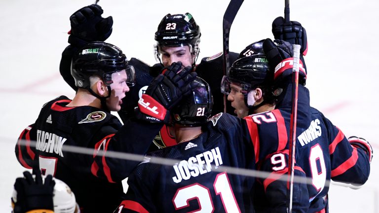 Ottawa Senators centre Josh Norris (9) celebrates a goal against the Nashville Predators during third period NHL hockey action in Ottawa, on Thursday, April 7, 2022. (Justin Tang//CP)