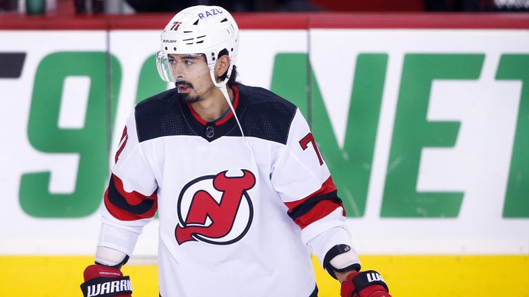 NHL profile photo on New Jersey Devils player Jonas Siegenthaler, from Switzerland, at a game against the Calgary Flames in Calgary, Alta. on March 16, 2022. (Larry MacDougal/CP)