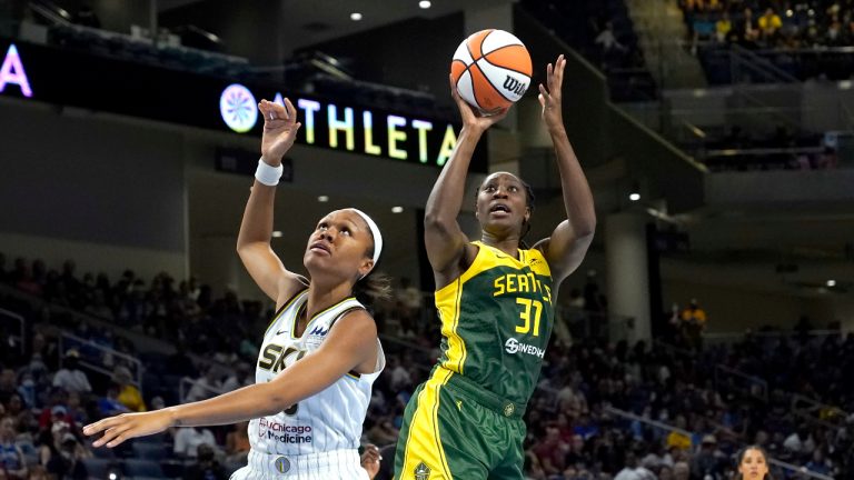 Seattle Storm's Tina Charles (31) shoots over Chicago Sky's Azura Stevens during the second half of a WNBA basketball game Wednesday, July 20, 2022, in Chicago. The Sky won 78-74. (Charles Rex Arbogast/AP)